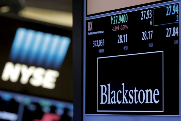 The ticker and trading information for Blackstone Group is displayed at the post where it is traded on the floor of the New York Stock Exchange (NYSE) April 4, 2016.
