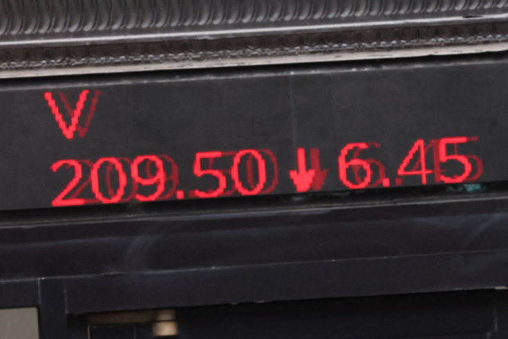 Stocks showing losses are displayed at the entrance to the New York Stock Exchange (NYSE) in New York City, in New York, U.S., February 24, 2022. 
