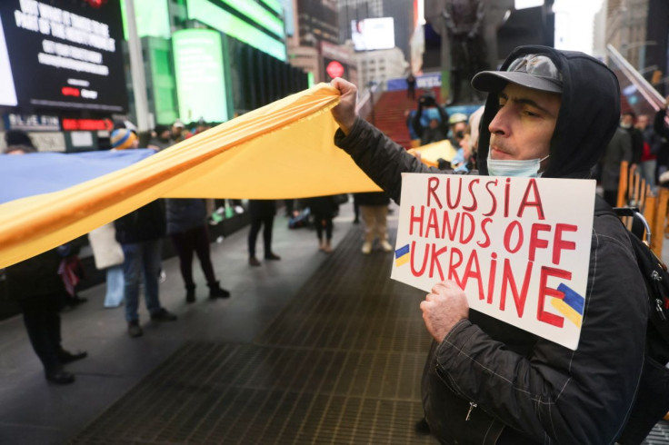 People take part in a protest against Russia's military operation in Ukraine, in Times Square, in New York City, U.S., February 24, 2022. 