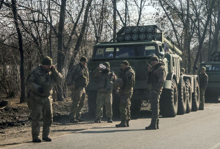 Ukrainian army soldiers stand next to multiple launch missile systems, after Russian President Vladimir Putin authorised a military operation, in eastern Ukraine, in Kharkiv region, Ukraine February 24, 2022. 