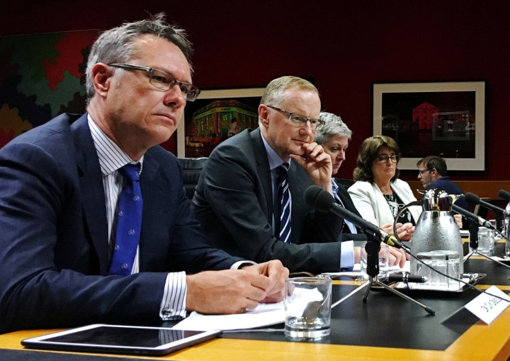 Reserve Bank of Australia Governor Philip Lowe (2nd L) speaks at a parliamentary committee hearing as he sits next to Deputy Governor Guy Debelle (L) in Sydney, Australia February 22, 2019.