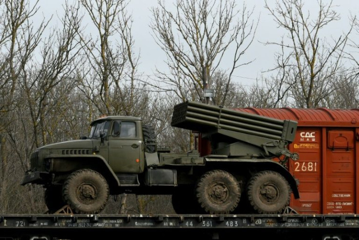 AFP saw military equipment, including rocket launchers, howitzers and fuel tanks, mounted on trains