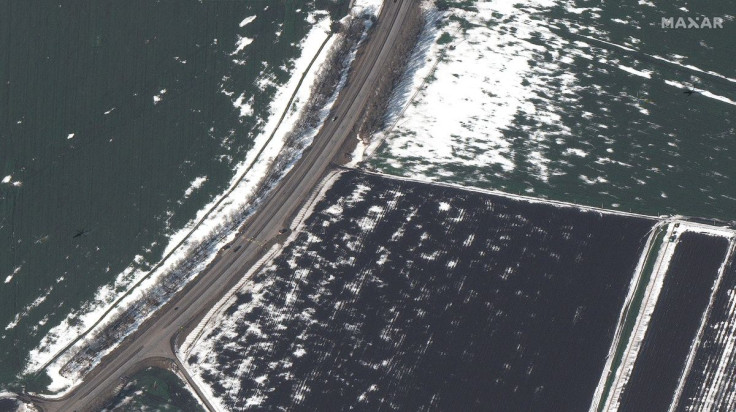 A satellite image shows ground attack helicopters flying near Tomarovka, Russia February 24, 2022. Courtesy of Satellite image 2022 Maxar Technologies/Handout via REUTERS