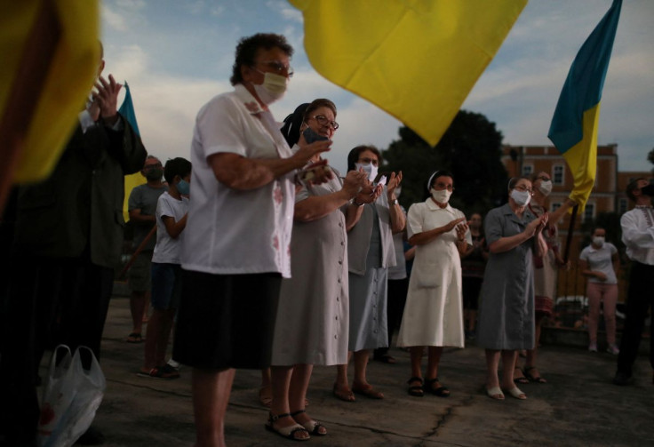 Descendants of Ukrainian immigrants, who are part of the largest Ukrainian community in Latin America, take part in a demonstration in support of Ukraine, in Prudentopolis city, in Parana state, Brazil February 24, 2022.