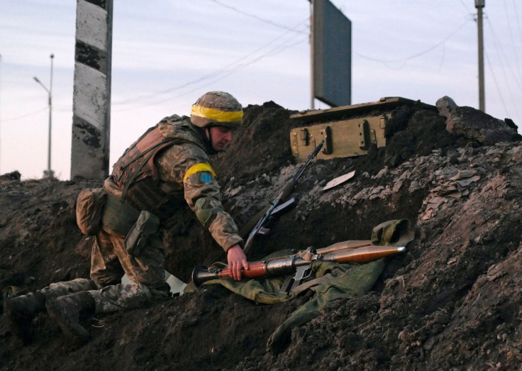 A Ukrainian serviceman holds a rocket-propelled grenade (RPG) launcher at fighting positions outside the city of Kharkiv, Ukraine February 24, 2022.