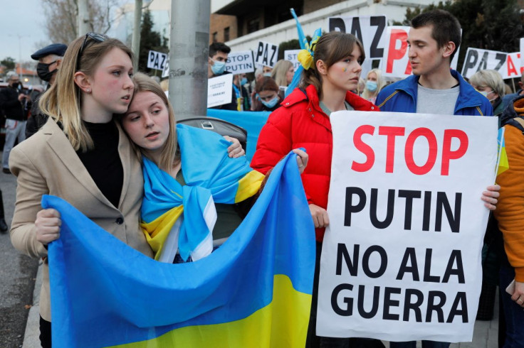 Ukrainians gather during a protest in front of the Russian Embassy, after Russian President Vladimir Putin authorised a military operation against Ukraine, in Madrid, Spain, February 24, 2022. 