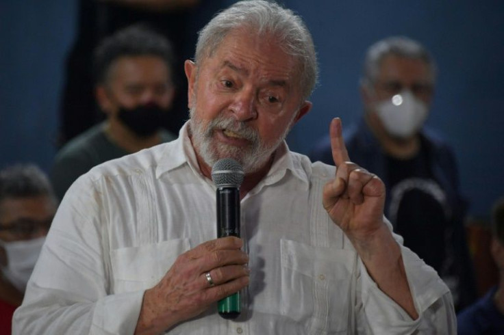 Brazil's leftist ex-president Luiz Inacio Lula da Silva, seen here in December 2021, is leading in national polls against Bolsonaro, but lagging behind in Evangelical support