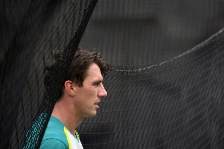 Australian captain Pat Cummins says his team are 'comfortable' with security in Pakistan watches his team during their final practice session at the Melbourne Cricket Ground (MCG) in Melbourne on February 25, 2022 before their departure for the team's fir