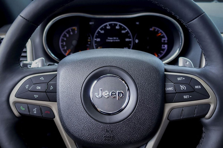 The logo of Jeep is seen on a steering wheel of the 2015 Jeep Grand Cherokee on a car dealership in New Jersey, July 24, 2015.