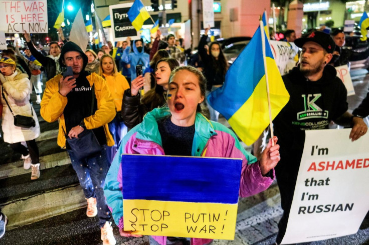 Members of the Russian community march during a demonstration against Russia, after it launched a massive military operation against Ukraine, in Los Angeles, California, U.S., February 24, 2022.