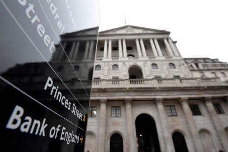 The Bank of England (BoE) building is reflected in a sign, after the BoE became the first major world's central bank to raise rates since the coronavirus disease (COVID-19) pandemic, London, Britain, December 16, 2021. 