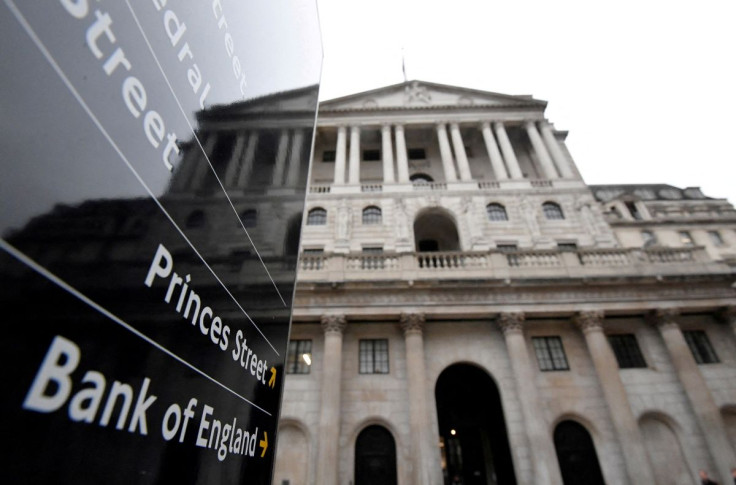 The Bank of England (BoE) building is reflected in a sign, after the BoE became the first major world's central bank to raise rates since the coronavirus disease (COVID-19) pandemic, London, Britain, December 16, 2021. 