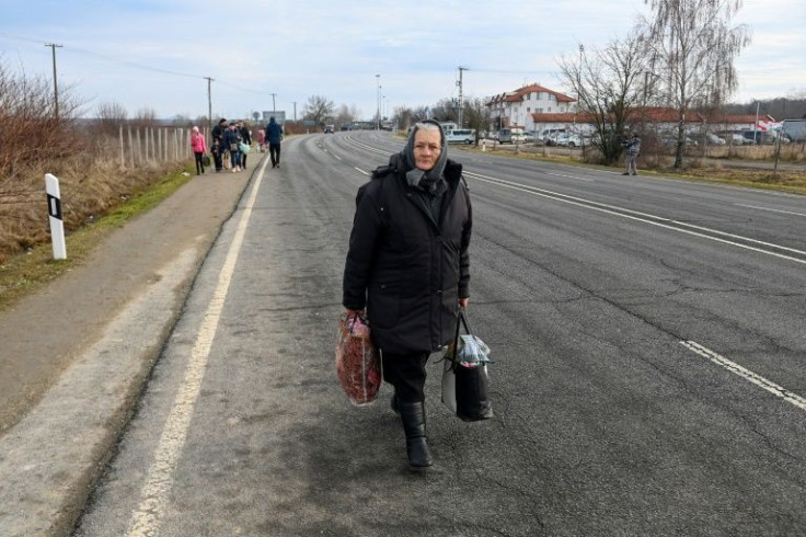 People in cars and on foot were seen crossing into Hungary
