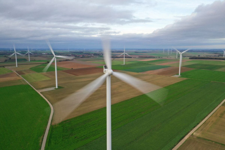 An aerial view shows power-generating windmill turbines in a wind farm in Morchies, France, November 8, 2020. Picture taken with a drone 