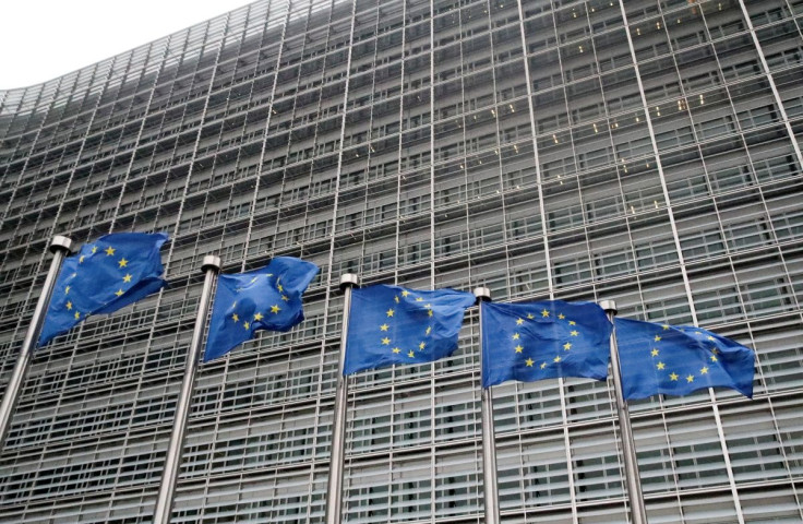 European Union flags flutter outside the EU Commission headquarters in Brussels, Belgium, July 14, 2021. 