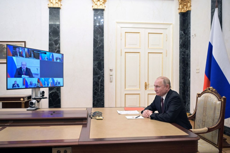 Russian President Vladimir Putin chairs a meeting with members of the Security Council via a video link in Moscow, Russia February 25, 2022. Sputnik/Alexey Nikolsky/Kremlin via REUTERS