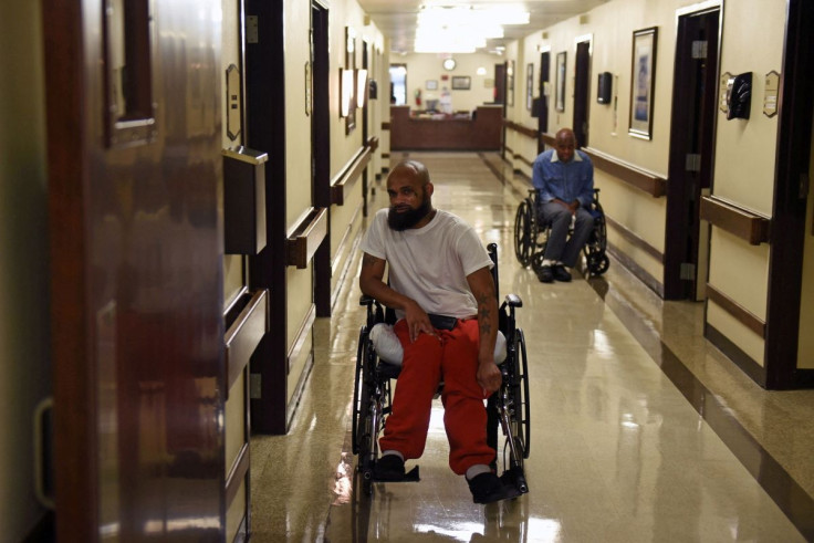 David Collie who was shot by police sits in a wheelchair at the nursing home where he lives in Fort Worth, Texas, U.S., September 27, 2019. 