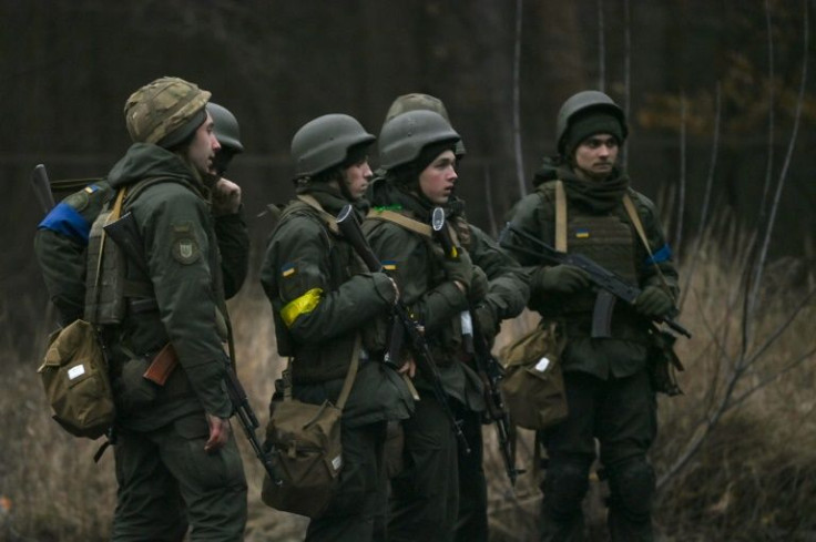 The different Ukrainian units defending Kyiv from a Russian invasion wear armbands to distinguish friend from foe