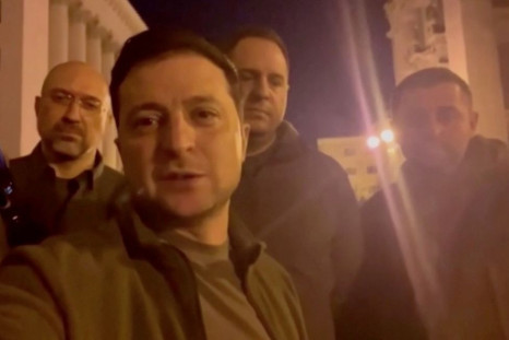 Ukrainian President Volodymyr Zelenskiy speaks alongside other Ukrainian officials in the governmental district of Kyiv, confirming that he is still in the capital, in Kyiv, Ukraine February 25, 2022 in this screengrab obtained from a handout video. Ukrai