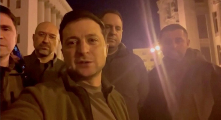 Ukrainian President Volodymyr Zelenskiy speaks alongside other Ukrainian officials in the governmental district of Kyiv, confirming that he is still in the capital, in Kyiv, Ukraine February 25, 2022 in this screengrab obtained from a handout video. Ukrai