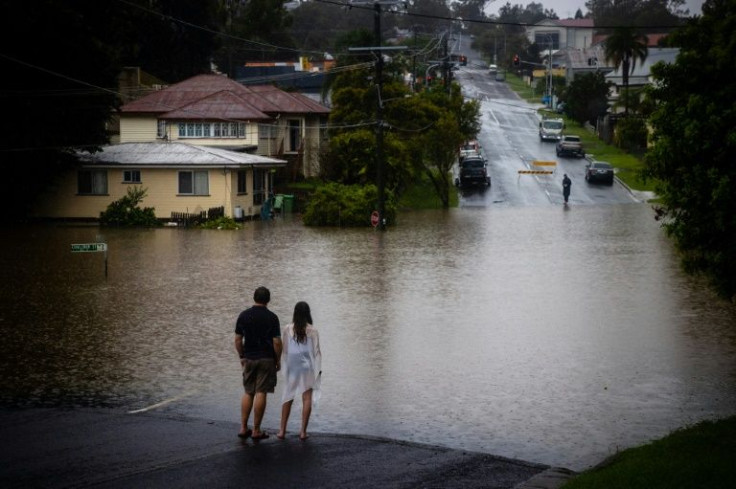 Four people have been killed in floods in eastern Australia as the state of Queensland sees some of the heaviest rains in decades
