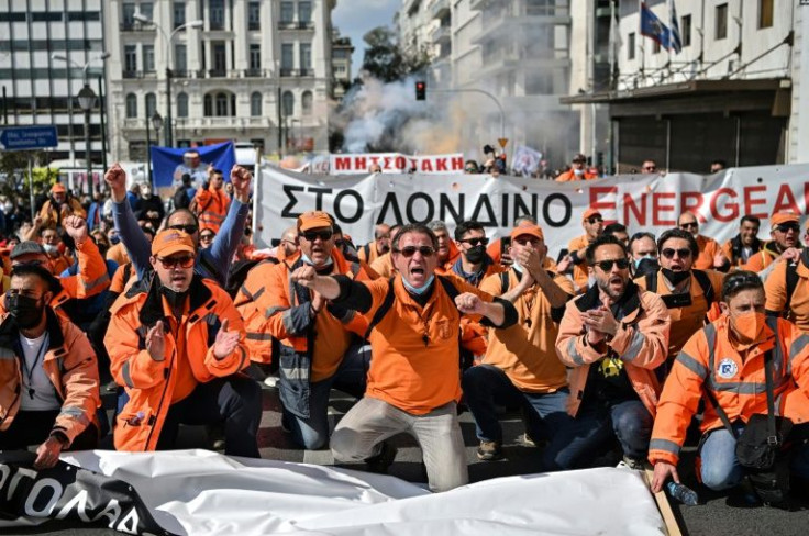 Ten thousand demonstrators led by Communist-affiliated union PAME rallied outside parliament against spiking inflation
