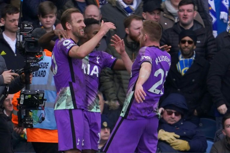 Harry Kane (left) celebrates after scoring Tottenham's third goal at Leeds
