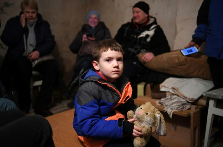 'Let them open a corridor... so that we can send the little kids out,' 58-year-old Nadezhda Tkachuk said