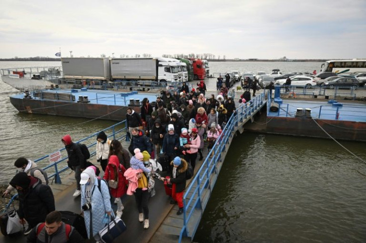 Hundreds stepped off the ferry crossing the Danube river from Ukraine on Saturday