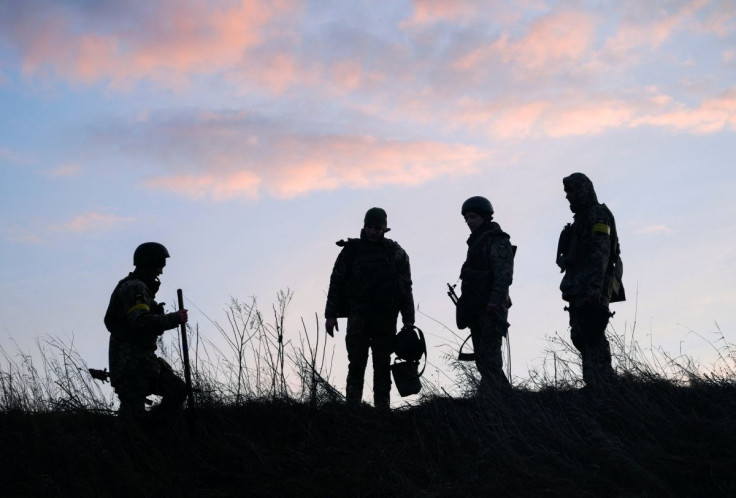 Ukrainian servicemen take positions at the military airbase Vasylkiv in the Kyiv region, Ukraine February 26, 2022.  