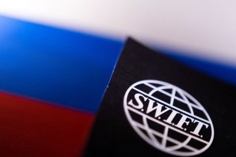 Swift logo is placed on a Russian flag are seen in this illustration taken, Bosnia and Herzegovina, February 25, 2022. 