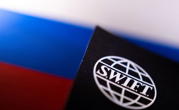 Swift logo is placed on a Russian flag are seen in this illustration taken, Bosnia and Herzegovina, February 25, 2022. 