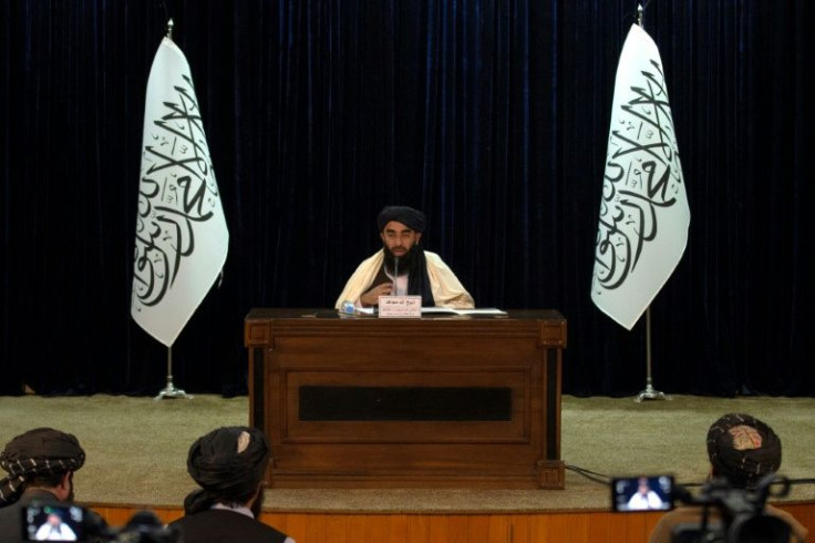 Taliban spokesman Zabihullah Mujahid tells the press about the security sweep in Kabul and other Afghan cities