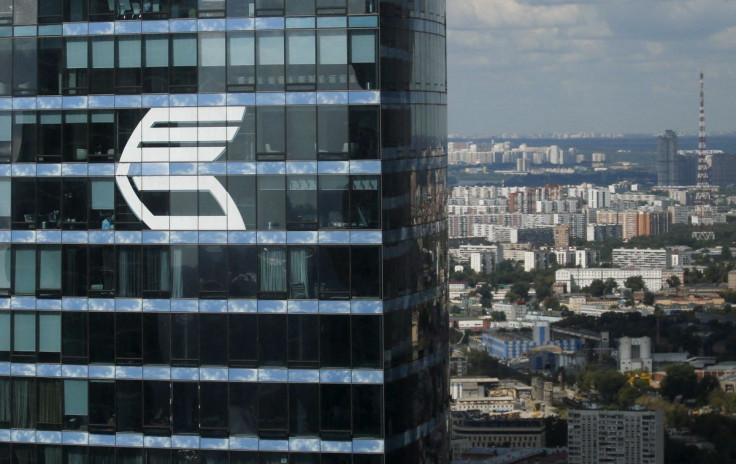 The logo of VTB Group is seen through a window of Imperia Tower on the facade of the Federatsiya (Federation) Tower at the Moscow International Business Center also known as "Moskva-City", in Moscow, Russia, in this August 5, 2015. 