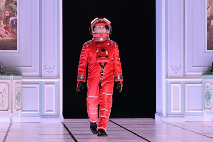 US fashion designer Jeremy Scott added an early space age touch when he hit the runway for Moschino
