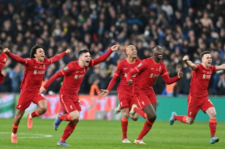 Liverpool players celebrate winning the League Cup final