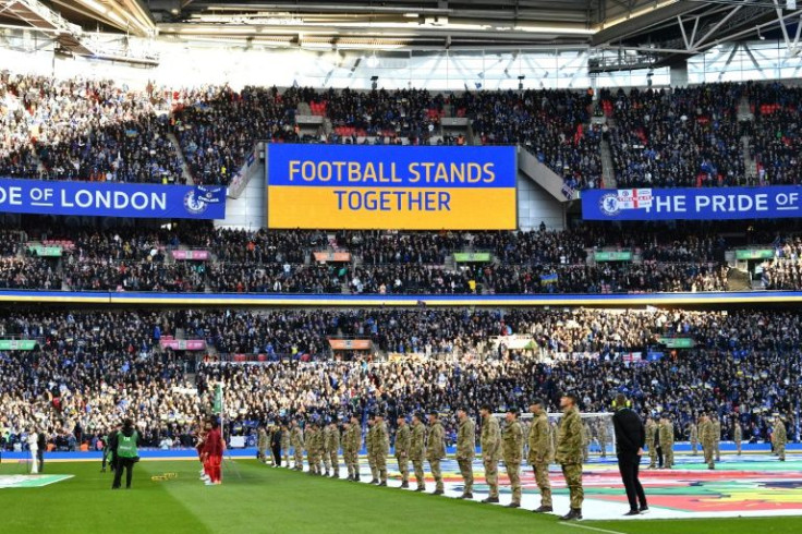 A 'Football Stands Together' message is displayed in Ukrainian colours ahead of the English League Cup final football match between Chelsea and Liverpool at Wembley Stadium
