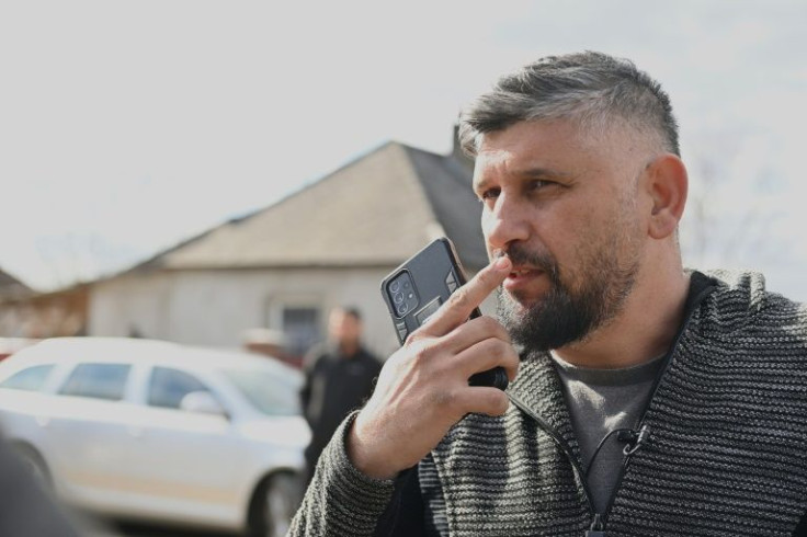 Church leader Pater Attila joined dozens of compatriots in the border town of Tiszabecs ready to aid Ukrainians fleeing their war-town country