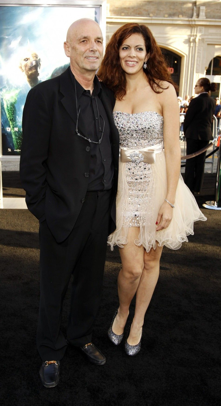 Director Martin Campbell and his wife Sol E. Romero pose at the premiere of his movie &quot;Green Lantern&quot; at the Grauman's Chinese theatre in Hollywood, California June 15, 2011. The movie opens in the U.S. on June 17. 