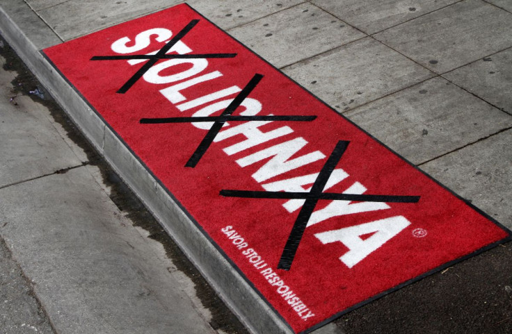 A piece of carpet with a logo of Stolichnaya, a brand of Russian vodka, is marked with black tape during a news conference at Micky's nightclub in West Hollywood, California August 1, 2013. 
