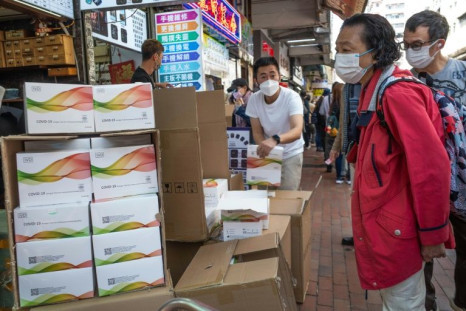 People in Hong Kong have been buying their own Covid rapid tests as the city sees a massive surge of Omicron cases
