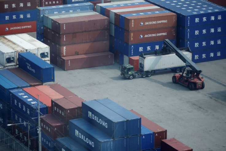 A truck moves a shipping container at Pyeongtaek port in Pyeongtaek, South Korea, July 9, 2020.