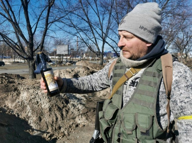 Kyiv residents are filling their trenches with boxes of Molotov cocktails in preparation for a Russian invasion