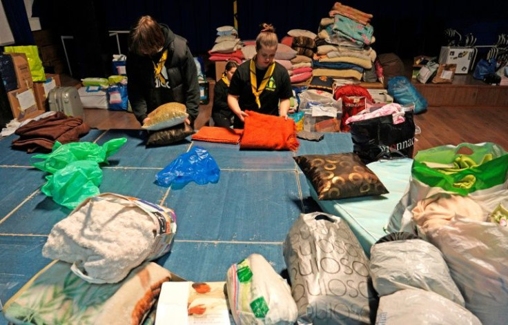 Scouts have helped sort the aid sent to help the refugees