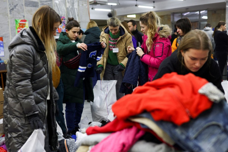 Volunteers sort through supplies donated by members of the public that are destined for internally displaced people, civil defence troops and the military, in Lviv, Ukraine February 28, 2022. 