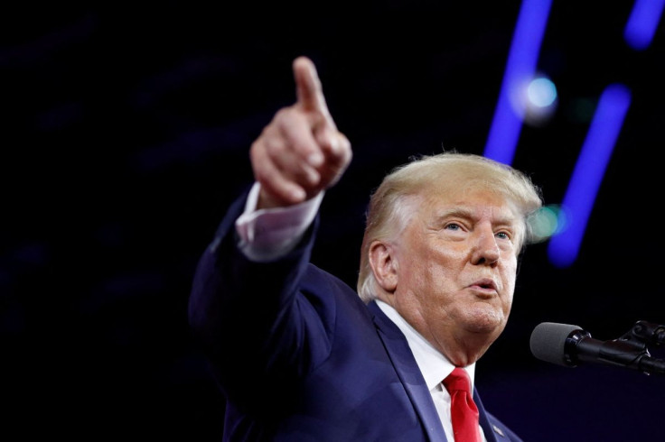 Former U.S. President Donald Trump gestures as he speaks during the Conservative Political Action Conference (CPAC) in Orlando, Florida, U.S. February 26, 2022. 