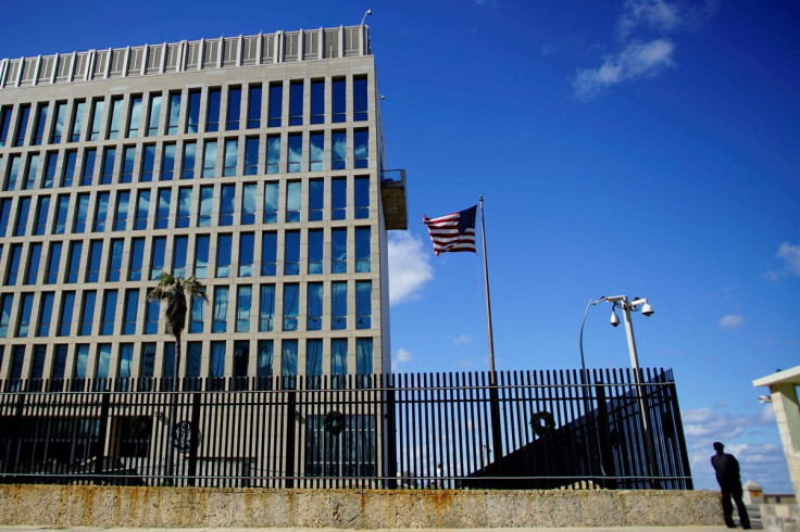 A security guard stands outside the U.S. Embassy in Havana, Cuba, December 12, 2017. 