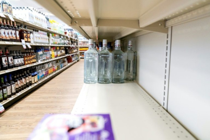 An empty space is seen on a shelf where Russian vodka used to be displayed for sale at a Virginia Alcoholic Beverage Control Authority store in Arlington, Virginia, on February 28, 2022