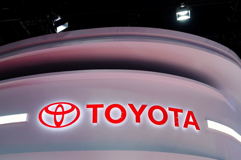 The Toyota logo is seen at its booth during a media day for the Auto Shanghai show in Shanghai, China April 19, 2021. 
