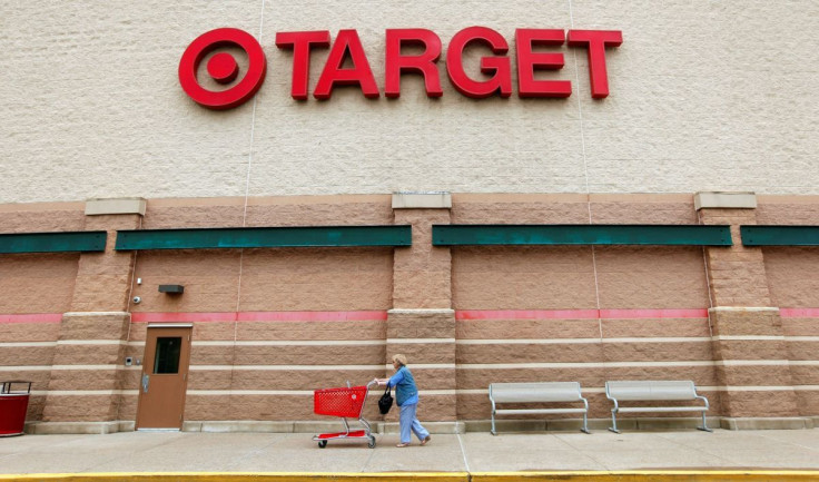 A Target shopper pushes her card outside a store in Falls Church, Virginia May 14, 2012. 